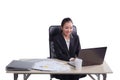 Young businesswoman working in office, typing, using computer. Royalty Free Stock Photo