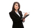 Young businesswoman writing in notebook Royalty Free Stock Photo