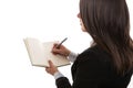 Young businesswoman writing in notebook Royalty Free Stock Photo