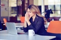 Young busy beautiful latin business woman suffering stress working at office computer Royalty Free Stock Photo