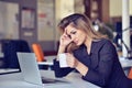 Young busy beautiful latin business woman suffering stress working at office computer Royalty Free Stock Photo