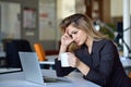 Young busy beautiful latin business woman suffering stress working at office computer Royalty Free Stock Photo