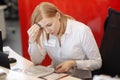 Young busy beautiful latin business woman suffering stress working at office computer Royalty Free Stock Photo