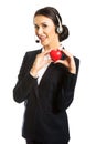 Young call center woman holding heart model Royalty Free Stock Photo