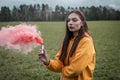 Young calm girl in pink smoke. sensual portrait Royalty Free Stock Photo