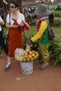 Young Cambodian woman sells fruit Royalty Free Stock Photo