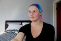 Portrait of a young cancer patient in a headscarf looks off to side Royalty Free Stock Photo