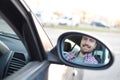 Happy handsome young man driver in his car looking to the road Royalty Free Stock Photo