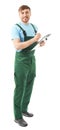 Young car mechanic with clipboard on white background Royalty Free Stock Photo