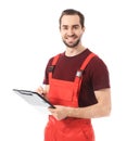 Young car mechanic with clipboard on white background Royalty Free Stock Photo