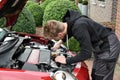 Young car mechanic at work Royalty Free Stock Photo