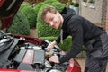 Young car mechanic at work Royalty Free Stock Photo