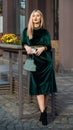 Young and carefree. girl care gem stone handbag or purse. glam clutch accessory. elegant woman in green velour dress