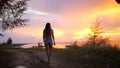 Young Carefree Tourist Girl Walking To Take Photo of Beautiful Sunset. Thailand. HD Slowmotion.