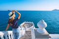 Tourist woman in white sun hat enjoying sea or ocean view in Balcon del Mediterraneo, Benidorm, Spain. Summer vacation. Royalty Free Stock Photo