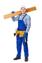 Young carpenter whis wooden plank