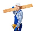 Young carpenter whis wooden plank