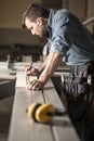 Young carpenter at work Royalty Free Stock Photo