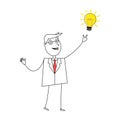 Young cartoon businessman pointing at light bulb Royalty Free Stock Photo