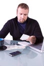 Young Casual Businessman Working at his Desk