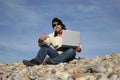 Young casual man with laptop Royalty Free Stock Photo