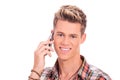 Young casual man speaking on phone Royalty Free Stock Photo