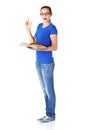 Young casual student woman with book and pointing up. Royalty Free Stock Photo