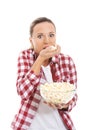 Young casual woman eating popcorn. Royalty Free Stock Photo