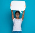 Young casual woman raising her speech bubble overhead