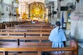 A young Catholic monk prays at Cebu Metropolitan Cathedral,during an afternoon visit