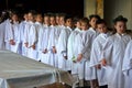 Young Catholics Waiting in Line to Receive First Communion