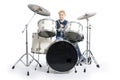 Young caucasian boy at drum kit in studio plays music Royalty Free Stock Photo