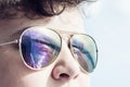 Young caucasian boy with mirroring bridge in sunglasses Royalty Free Stock Photo