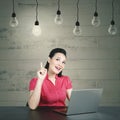 Young caucasian business woman having her aha moment getting bright ideas Royalty Free Stock Photo