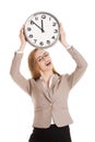 Young caucasian business woman holding clock. Royalty Free Stock Photo