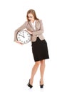 Young caucasian business woman holding clock. Royalty Free Stock Photo