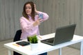 Young caucasian business woman in pink shirt in office doing selfie on the phone Royalty Free Stock Photo