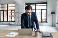 Young Caucasian businessman work online on laptop Royalty Free Stock Photo