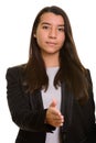 Young Caucasian businesswoman giving handshake for agreement Royalty Free Stock Photo