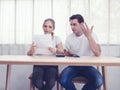 Young caucasian couple hand holding credit card and debt bill on table in home,men and women have overdue financial foreclosure Royalty Free Stock Photo