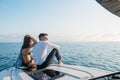 Caucasian couple in love relaxing on yacht bow, Travelling lifestyle concept Royalty Free Stock Photo