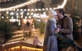 Young caucasian couple in love standing close, smiling