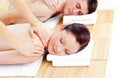 Young caucasian couple receiving a back massage Royalty Free Stock Photo