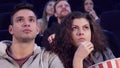 Couple watches horror at the movie theater Royalty Free Stock Photo