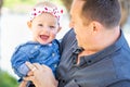 Young Caucasian Father and Baby Girl At The Park