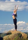 Young caucasian fitness woman practicing yoga