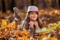 Young caucasian girl, candid autumnal portrait in the forest Royalty Free Stock Photo