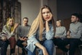 Young caucasian lady is the member of anonymous club of alcoholics Royalty Free Stock Photo