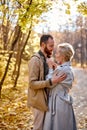 Young lovers hugging at park. Cute couple in love embracing during date. Royalty Free Stock Photo