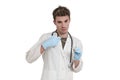 Young caucasian male doctor preparing a dose of a vaccine, isolated. Royalty Free Stock Photo